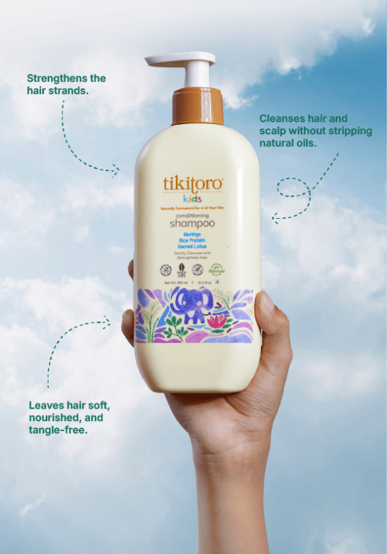Kids shampoo hand holding product